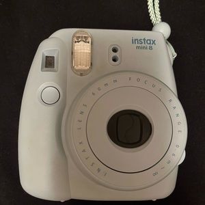 Used; like new, film not included, batteries included.